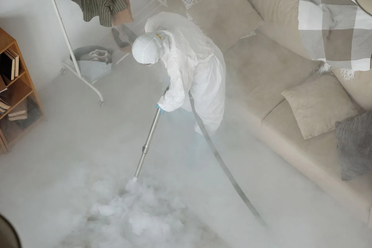 Biohazard cleanup technician in protective equipment, Cutler Bay, FL